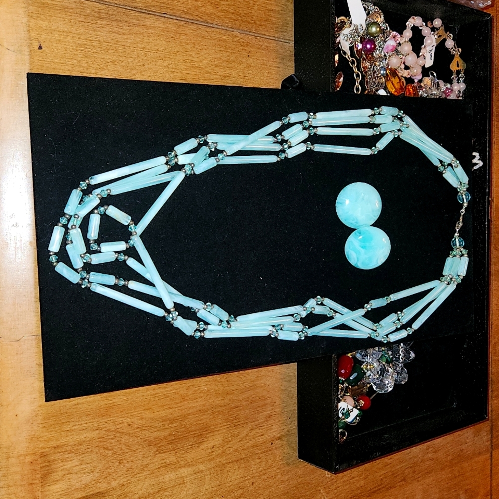 Vintage Four Strand Light Green Necklace w/ clip on earrings.